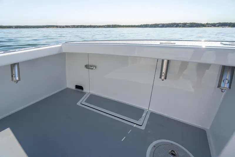 Slide: The Image of 2025 Mussel Ridge 42 boat deck with sleek design and ocean view. - 24