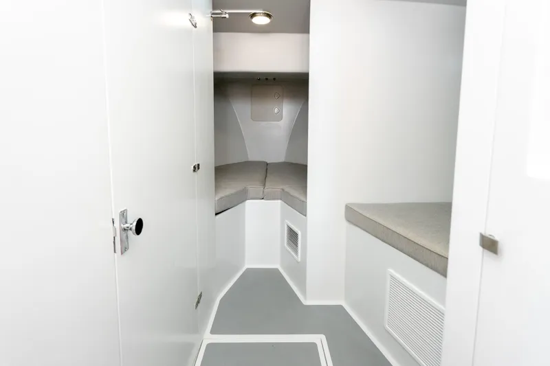 Slide: The Image of Interior cabin of 2025 Mussel Ridge 42 boat, featuring modern design and comfortable seating. - 44