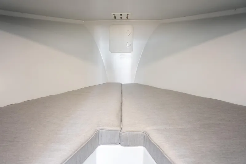 Slide: The Image of Interior cabin of 2025 Mussel Ridge 42 boat with cushioned sleeping area. - 46