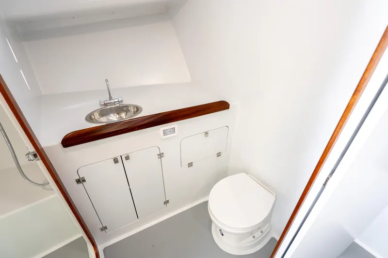 Slide: The Image of Modern bathroom in 2025 Mussel Ridge 42 boat with sink and toilet. - 48