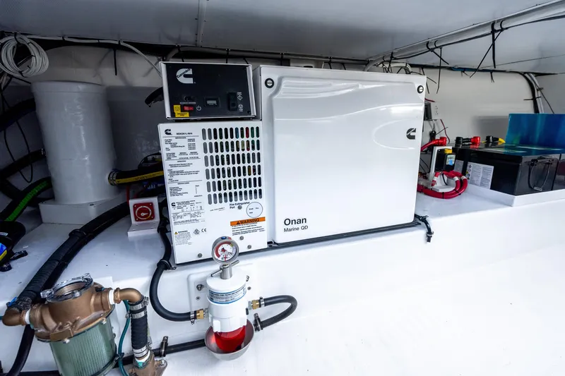 Slide: The Image of Engine room of 2025 Mussel Ridge 42 with Onan Marine QD generator. - 53