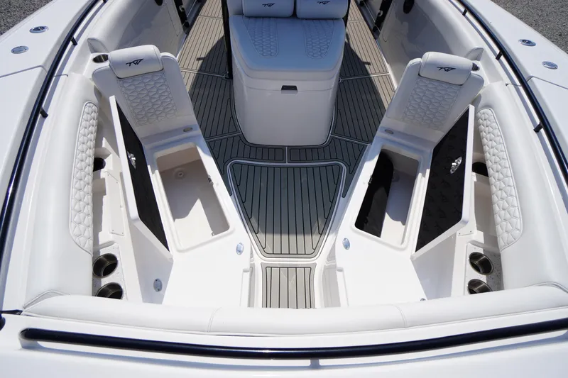 Slide: The Image of 2026 Tidewater 302 CC Adventure boat interior with seating and storage compartments. - 18