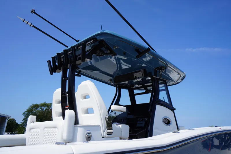 Slide: The Image of 2026 Tidewater 302 CC Adventure boat with sleek design and modern features. - 24