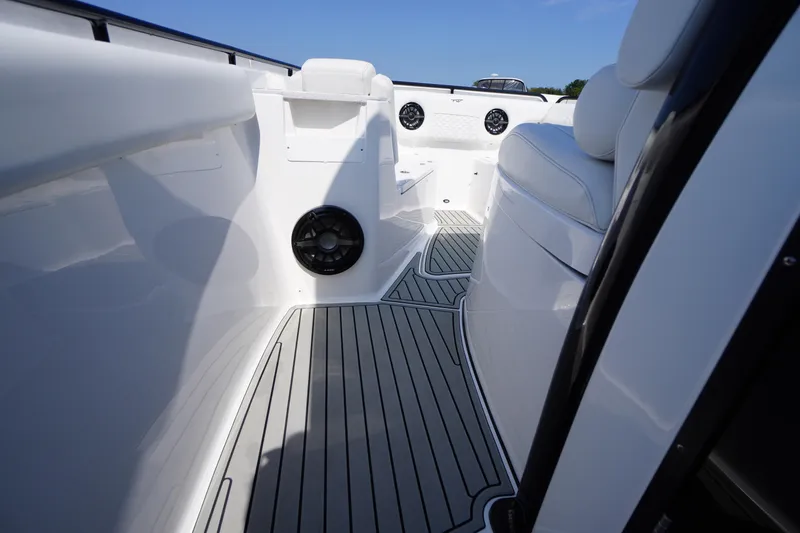 Slide: The Image of 2026 Tidewater 302 CC Adventure boat interior with sleek seating and modern design. - 26