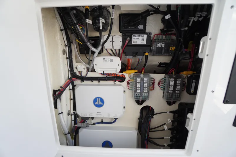Slide: The Image of Electrical panel of 2026 Tidewater 302 CC Adventure boat, showcasing wiring and components. - 36
