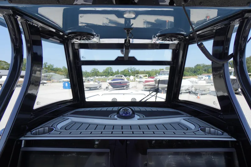 Slide: The Image of Interior view of 2026 Tidewater 302 CC Adventure boat cockpit with modern design. - 43
