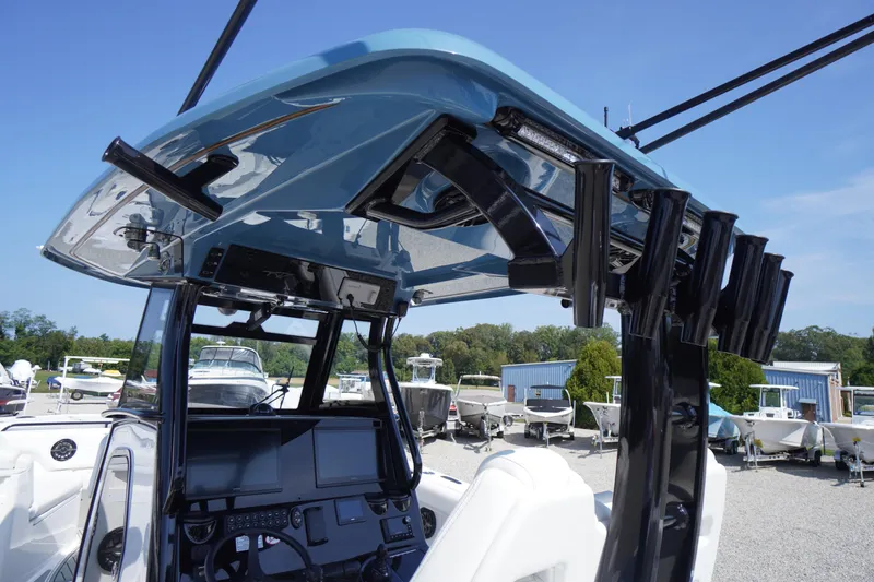 Slide: The Image of 2026 Tidewater 302 CC Adventure boat with advanced helm and rod holders. - 59