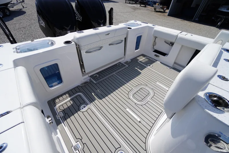 Slide: The Image of 2026 Tidewater 302 CC Adventure boat deck with sleek design and modern features. - 61