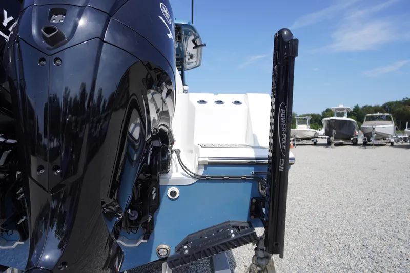 Slide: The Image of 2026 Tidewater 302 CC Adventure boat with powerful engine and Power-Pole anchor system. - 86