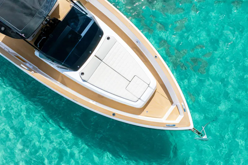 Slide: The Image of 2025 Pardo Yachts P38 cruising on clear turquoise waters. - 11