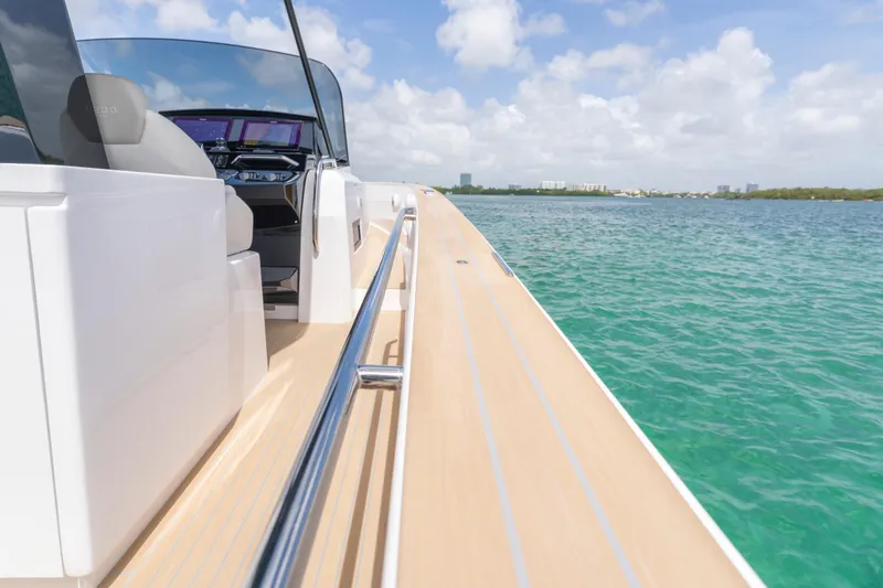 Slide: The Image of Luxury seating area on 2025 Pardo Yachts P38, featuring built-in storage. - 24