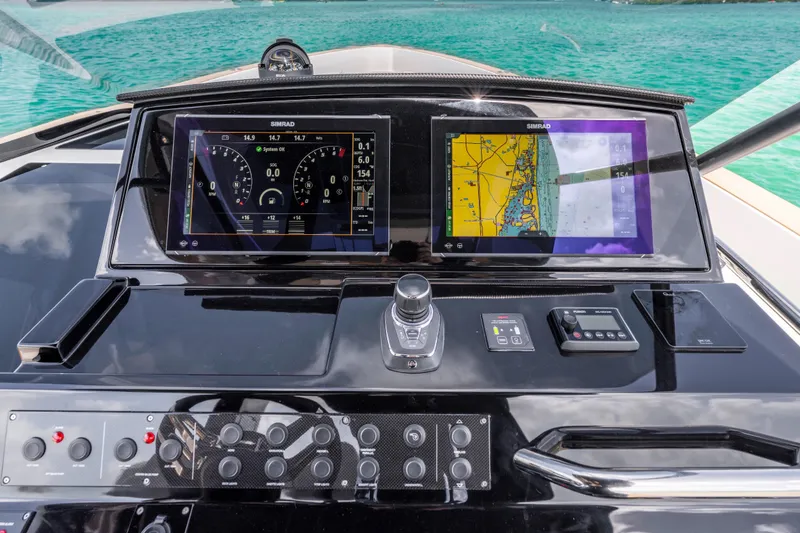 Slide: The Image of Steering console of 2025 Pardo Yachts P38, featuring modern controls and sleek design. - 35