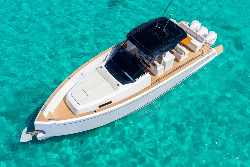 The Image of 2025 Pardo Yachts P38 cruising on clear turquoise waters. - 0