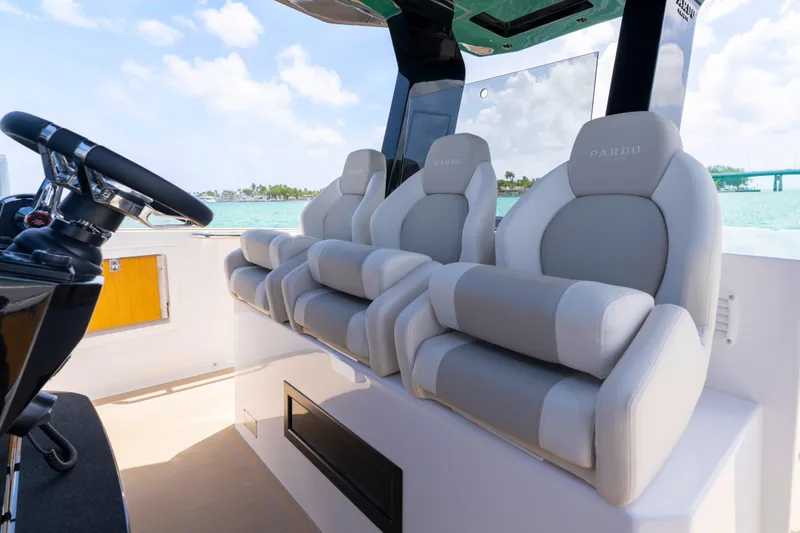 Slide: The Image of 2025 Pardo Yachts P38 bow view on turquoise water, showcasing sleek design. - 40