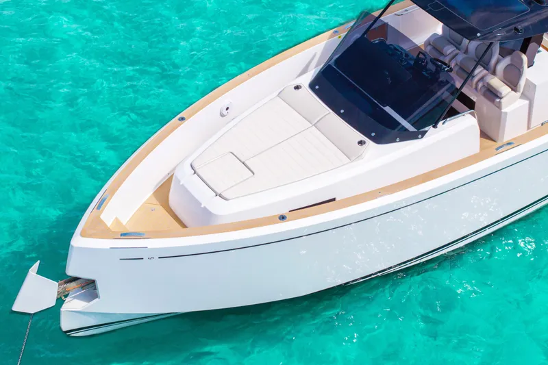Slide: The Image of Top view of 2025 Pardo Yachts P38 on clear turquoise water. - 7