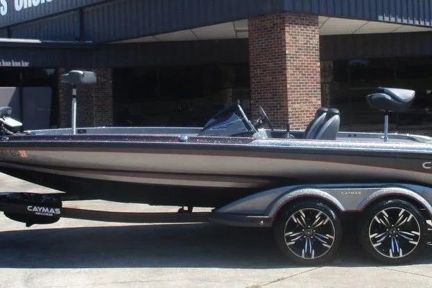 The Image of 2023 Caymas CX21 Pro boat with sleek design and modern features, parked outdoors. - 1