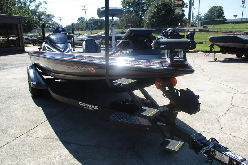 Slide: The Image of 2023 Caymas CX21 Pro boat on trailer in outdoor setting. - 4