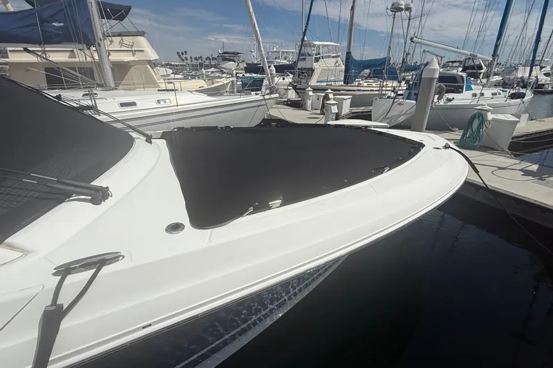 Slide: The Image of 2023 Boston Whaler 380 Realm docked at a marina, showcasing sleek design and modern features. - 35