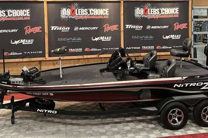 Slide: The Image of 2019 Nitro Z20 Pro bass boat displayed at Angler's Choice event. - 1