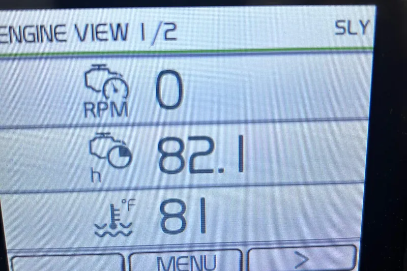 Slide: The Image of Display screen of 2023 Ranger Tugs R-31 CB showing engine RPM, hours, and temperature. - 21