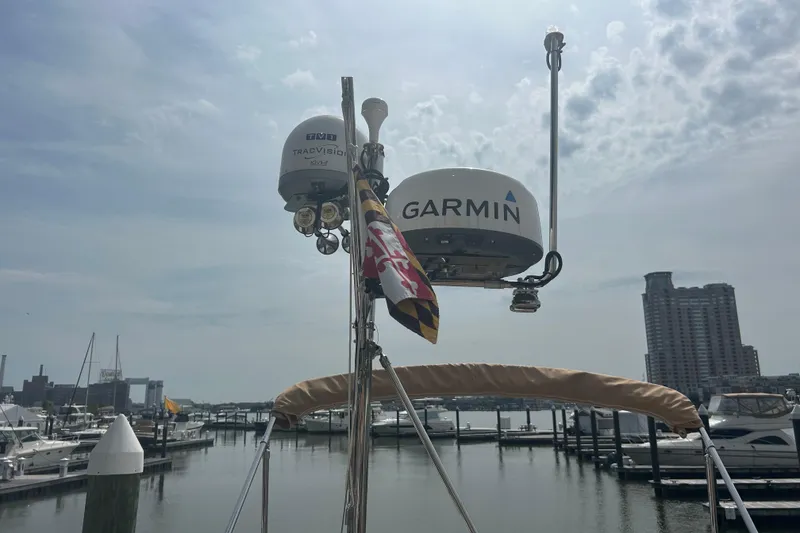 Slide: The Image of 2023 Ranger Tugs R-31 CB with Garmin equipment docked at a marina. - 7