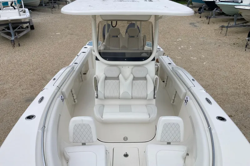Slide: The Image of 2026 Key West 260 Center Console boat with spacious seating and modern design. - 12