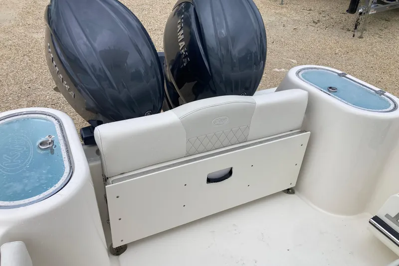 Slide: The Image of 2026 Key West 260 Center Console boat with dual Yamaha engines and live wells. - 14