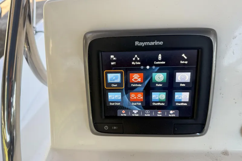 Slide: The Image of Raymarine navigation display on 2017 Boston Whaler 180 Dauntless boat dashboard. - 5