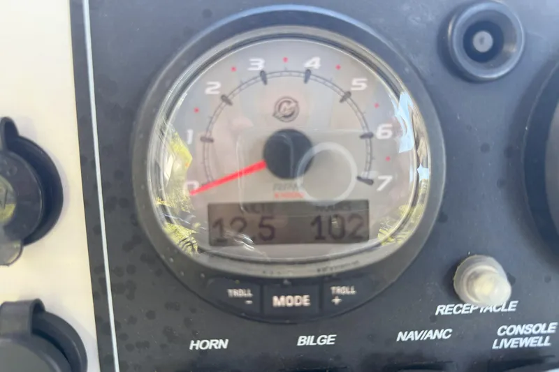 Slide: The Image of Close-up of 2017 Boston Whaler 180 Dauntless boat dashboard with gauge readings. - 6