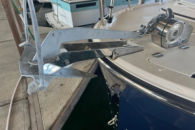 Slide: The Image of 2025 Ranger Tugs R-27 boat anchor and winch system at dock. - 30