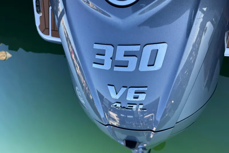 Slide: The Image of Ranger Tugs R-27 2025 boat engine, 350 V6 4.3L, in water. - 7