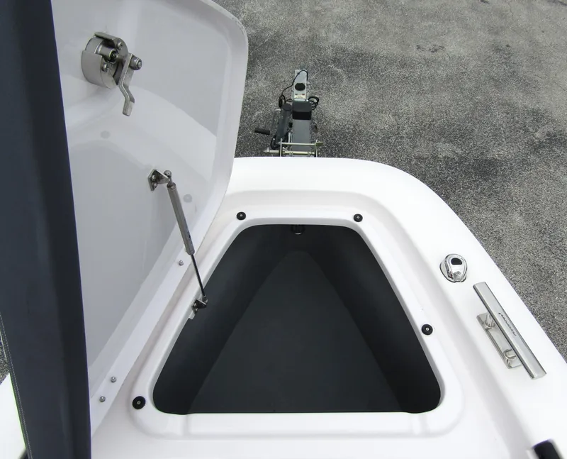 Slide: The Image of Open storage compartment on 2022 Axopar 22 T-Top boat. - 7
