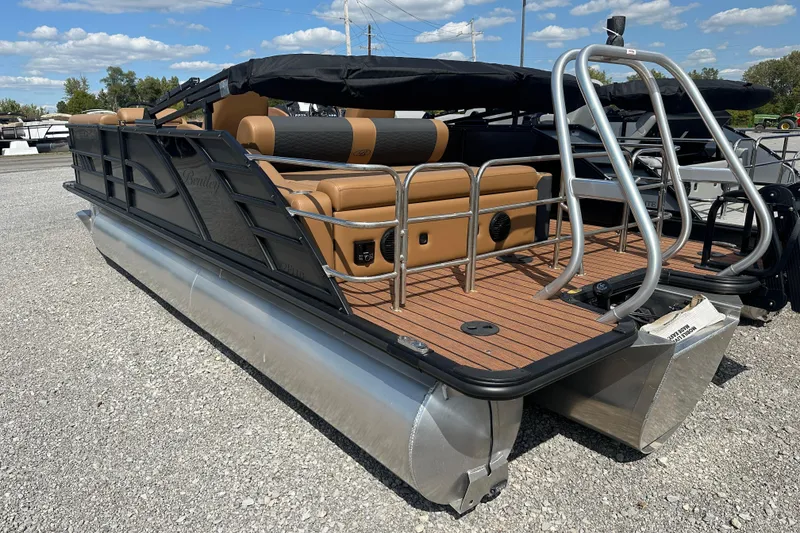 Slide: The Image of 2025 Bentley Pontoons 223 Elite Swingback with sleek design and luxurious seating. - 22
