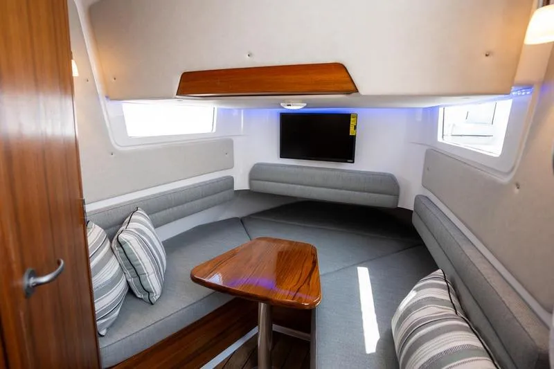 Slide: The Image of Luxurious interior of 2025 Southport 38 FE boat with cozy seating and modern amenities. - 28