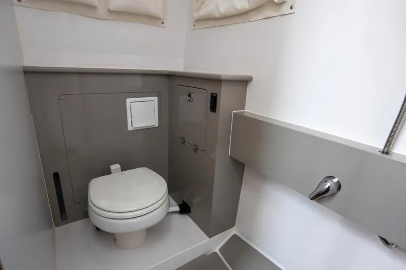 Slide: The Image of 2025 Southport 38 FE boat bathroom with modern fixtures and compact design. - 32