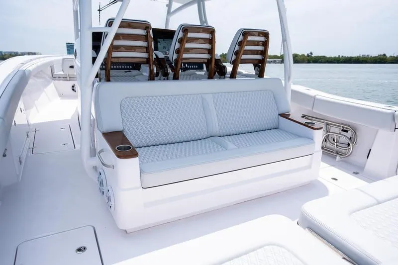 Slide: The Image of 2025 Southport 38 FE boat interior with luxurious seating and modern design. - 9