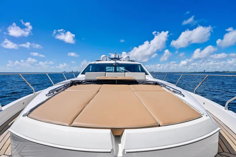 Slide: The Image of Luxurious 2013 Absolute 64 yacht with sunbathing deck on open sea under blue sky. - 13