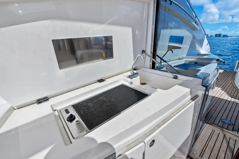 Slide: The Image of Outdoor kitchen on 2013 Absolute 64 yacht with grill and sink, ocean view. - 19
