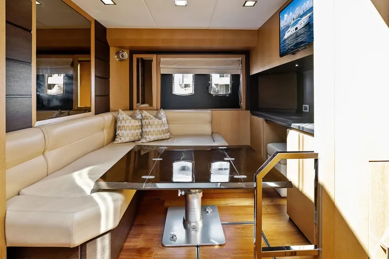Slide: The Image of Luxurious interior of 2013 Absolute 64 yacht with elegant seating and modern decor. - 34