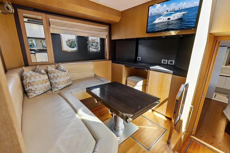 Slide: The Image of Luxurious interior of a 2013 Absolute 64 yacht with elegant seating and modern amenities. - 35