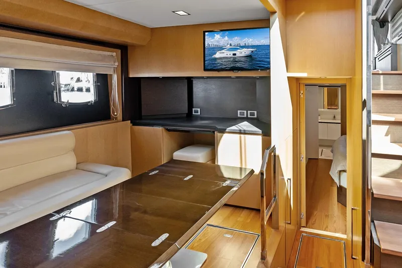 Slide: The Image of Luxurious interior of 2013 Absolute 64 yacht with modern furnishings and a flat-screen TV. - 37
