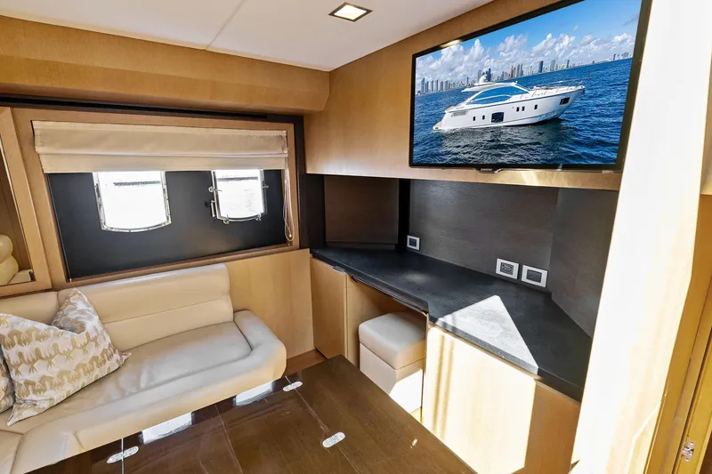 Slide: The Image of Luxurious interior of 2013 Absolute 64 yacht with sofa, desk, and TV. - 38