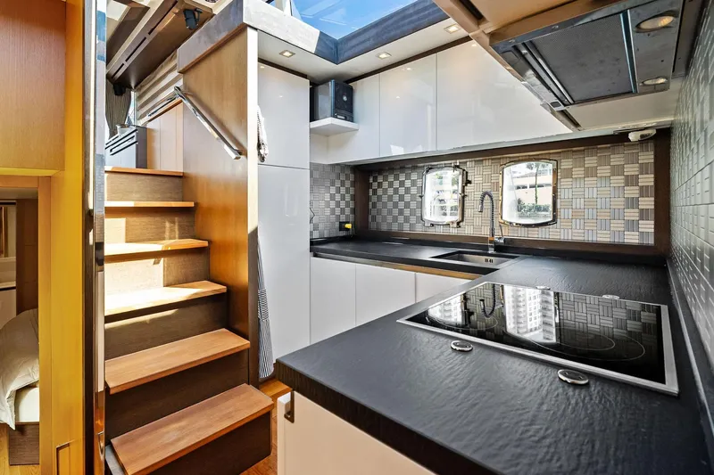 Slide: The Image of Luxurious kitchen interior of 2013 Absolute 64 yacht with modern design and sleek finishes. - 40