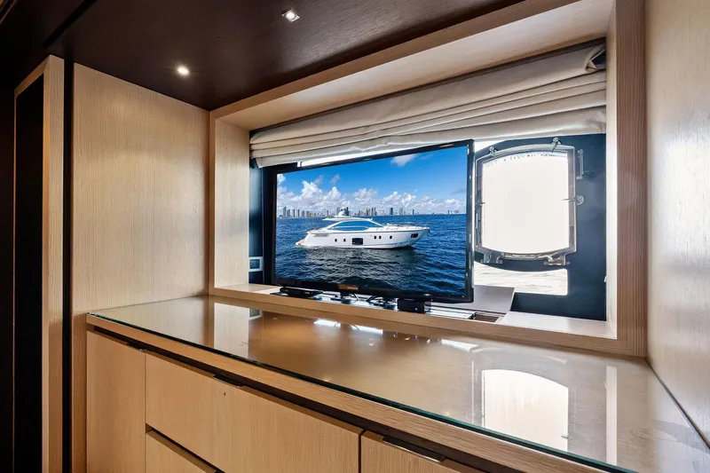 Slide: The Image of Luxurious interior of 2013 Absolute 64 yacht with TV and ocean view. - 48