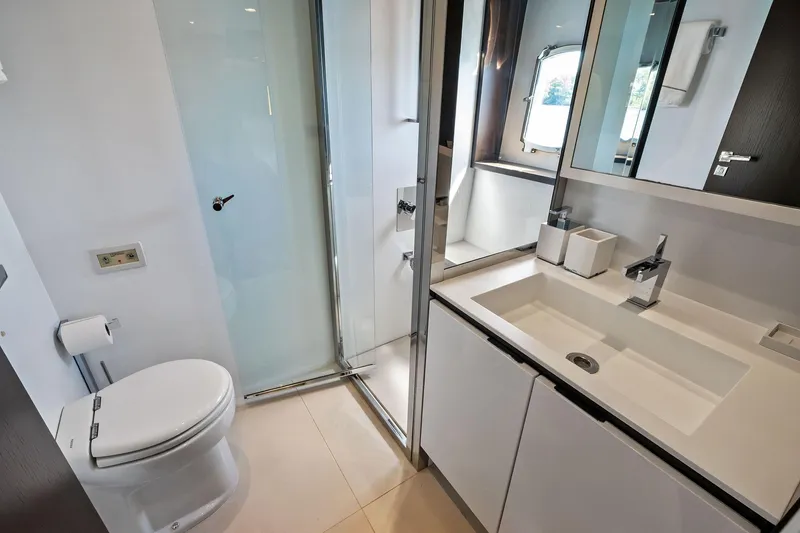 Slide: The Image of Luxurious bathroom on 2013 Absolute 64 yacht with modern fixtures and sleek design. - 53