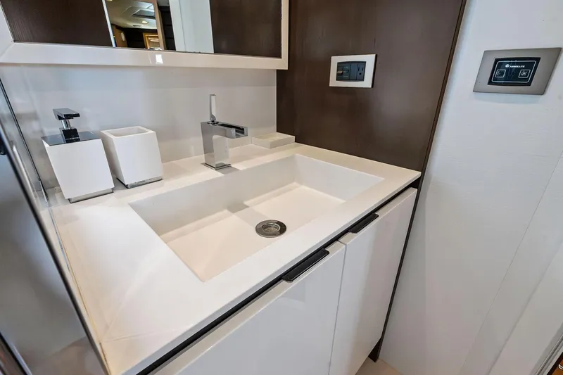 Slide: The Image of Modern bathroom sink on Absolute 64 yacht, 2013 model, with sleek fixtures and controls. - 54