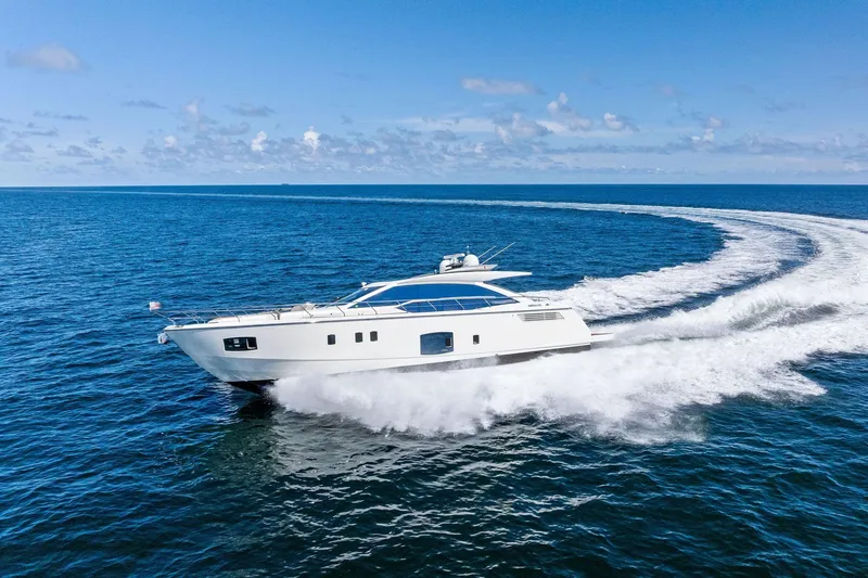 Slide: The Image of Luxurious 2013 Absolute 64 yacht cruising swiftly on open blue sea. - 65