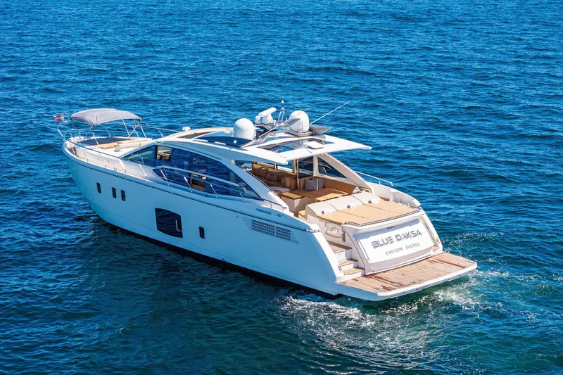 Slide: The Image of Luxury 2013 Absolute 64 yacht cruising on open blue sea. - 68