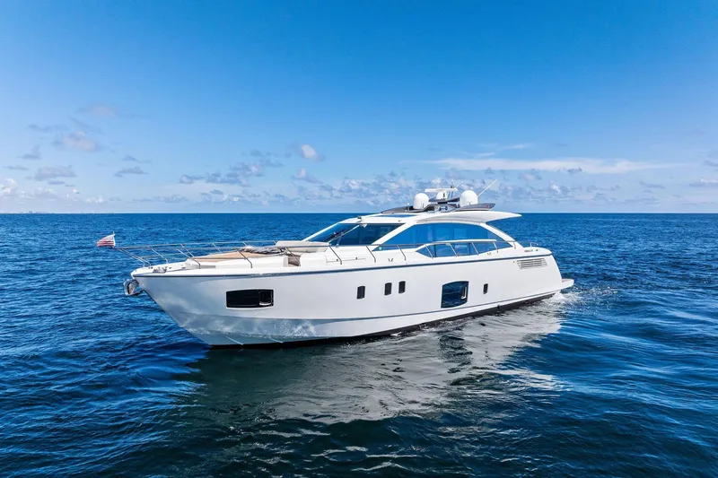 Slide: The Image of Luxury Absolute 64 yacht cruising on ocean with city skyline in background, 2013 model. - 7