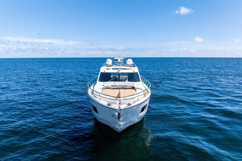 Slide: The Image of Luxury Absolute 64 yacht cruising on open sea under clear blue sky, 2013 model. - 8
